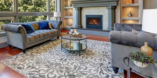 beautiful area rug in living room of home