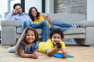 family enjoying their newly cleaned and sanitized carpet
